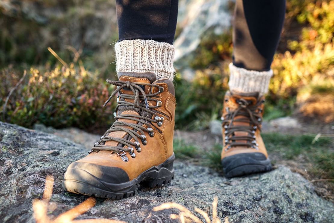 Tucking the bottoms of your pants into your socks is one way to prevent tick bites when you're hiking out in the wild.