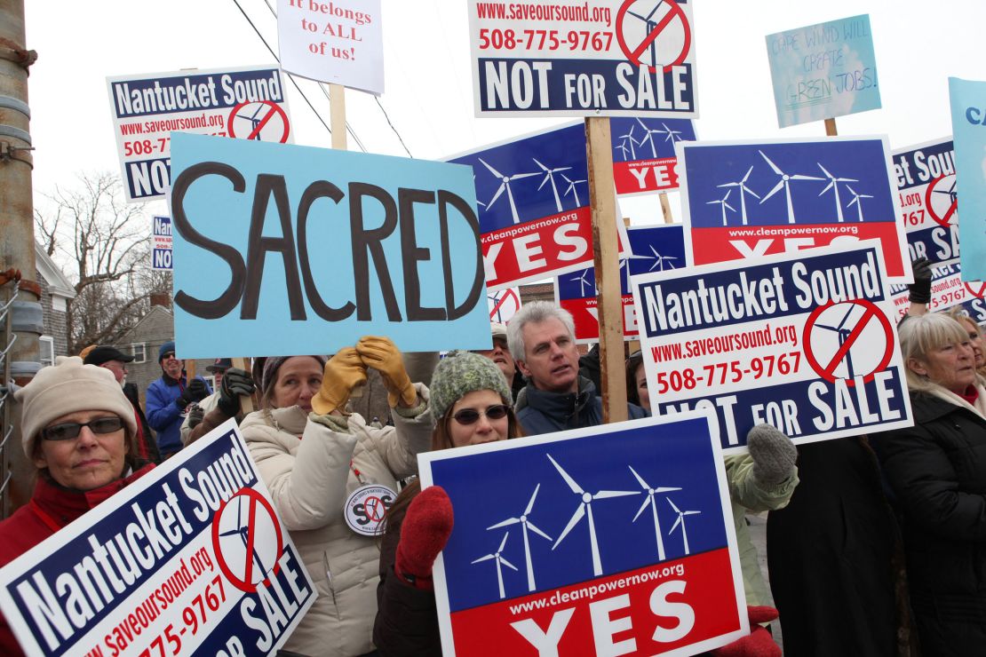 Supporters and opponents of the Cape Wind project protested outside the US Coastguard Station in Woodshole, Massachusetts in 2010.