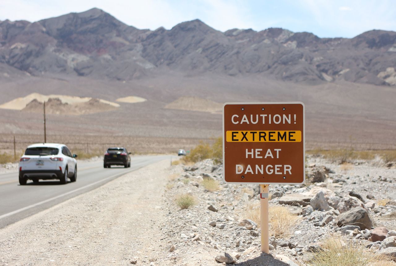 A heat advisory sign is shown along Highway 190 at Death Valley National Park in Death Valley, California, on July 16.