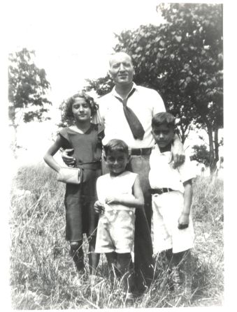 Bennett was born Anthony Dominick Benedetto in 1926. Here, he stands in front of his father, John, and his siblings Mary and John Jr. <a href="index.php?page=&url=https%3A%2F%2Fwww.facebook.com%2Ftonybennett%2Fphotos%2Fa.449756719901%2F10157868837569902%2F%3Ftype%3D3" target="_blank" target="_blank">This photo</a> was posted to Bennett's Facebook account for Father's Day in 2020. He said his dad "inspired my love of both art and music, and I owe much of my success to him."