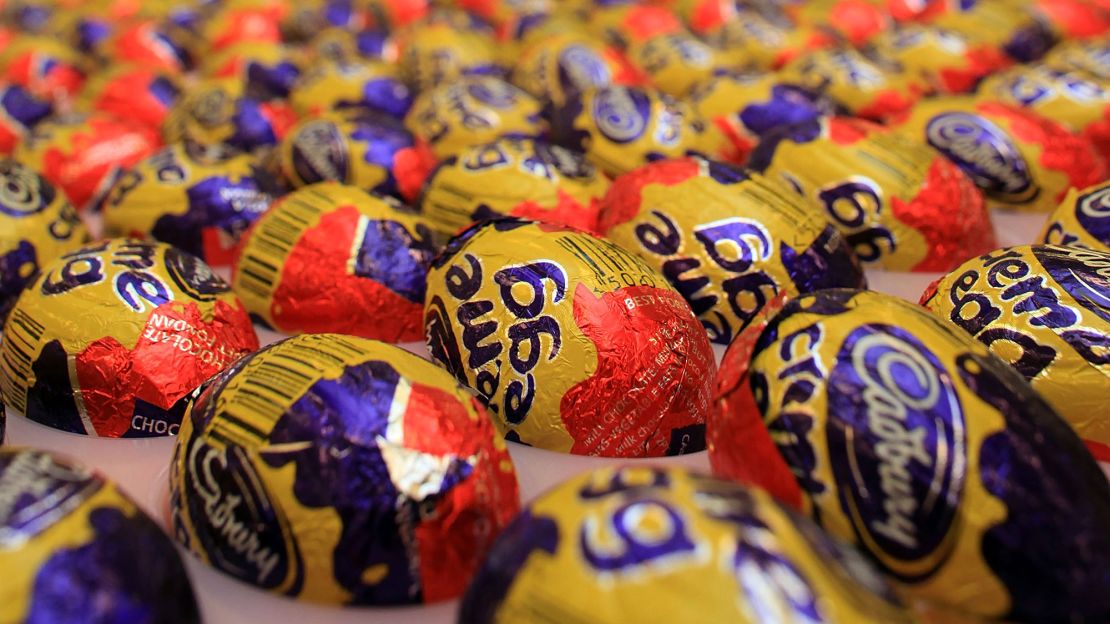 BIRMINGHAM, ENGLAND - DECEMBER 15:  Cadbury's Creme Eggs move down the production line at the Cadbury's Bournville production plant on December 15, 2009 in Birmingham, England. The historic confectioner is facing a hostile bid from food company Kraft. Workers and members of the union Unite held a meeting today and urged shareholders to resist selling up and to keep the company in British hands.  (Photo by Christopher Furlong/Getty Images)