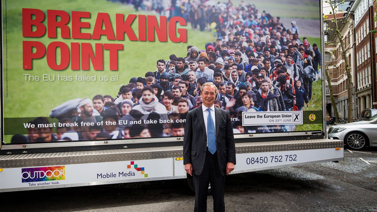 Former UKIP leader Nigel Farage poses with the party's infamous "Breaking Point" poster on June 16, 2016, ahead of the UK's referendum on leaving the EU.