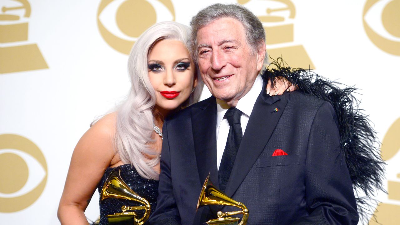 Lady Gaga and Tony Bennett pose with their Grammys for their 2014 album "Cheek to Cheek." 
