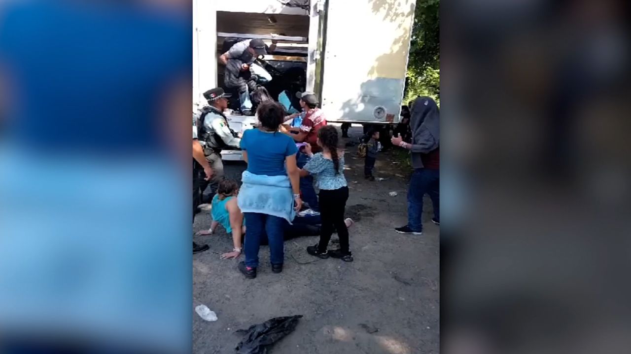 The truck was abandoned by its driver. The faces of rescued migrants were obscured by INM in this picture.