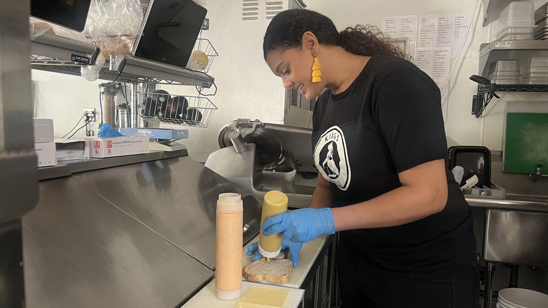 Rosie Blosser, co-owner of King's Deli, makes a pastrami sandwich on June 28.