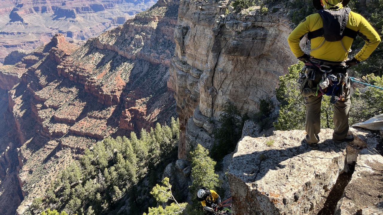 Emergency Services Coordinator James Thompson observes and directs operations during a search and rescue training exercise at the Grand Canyon.