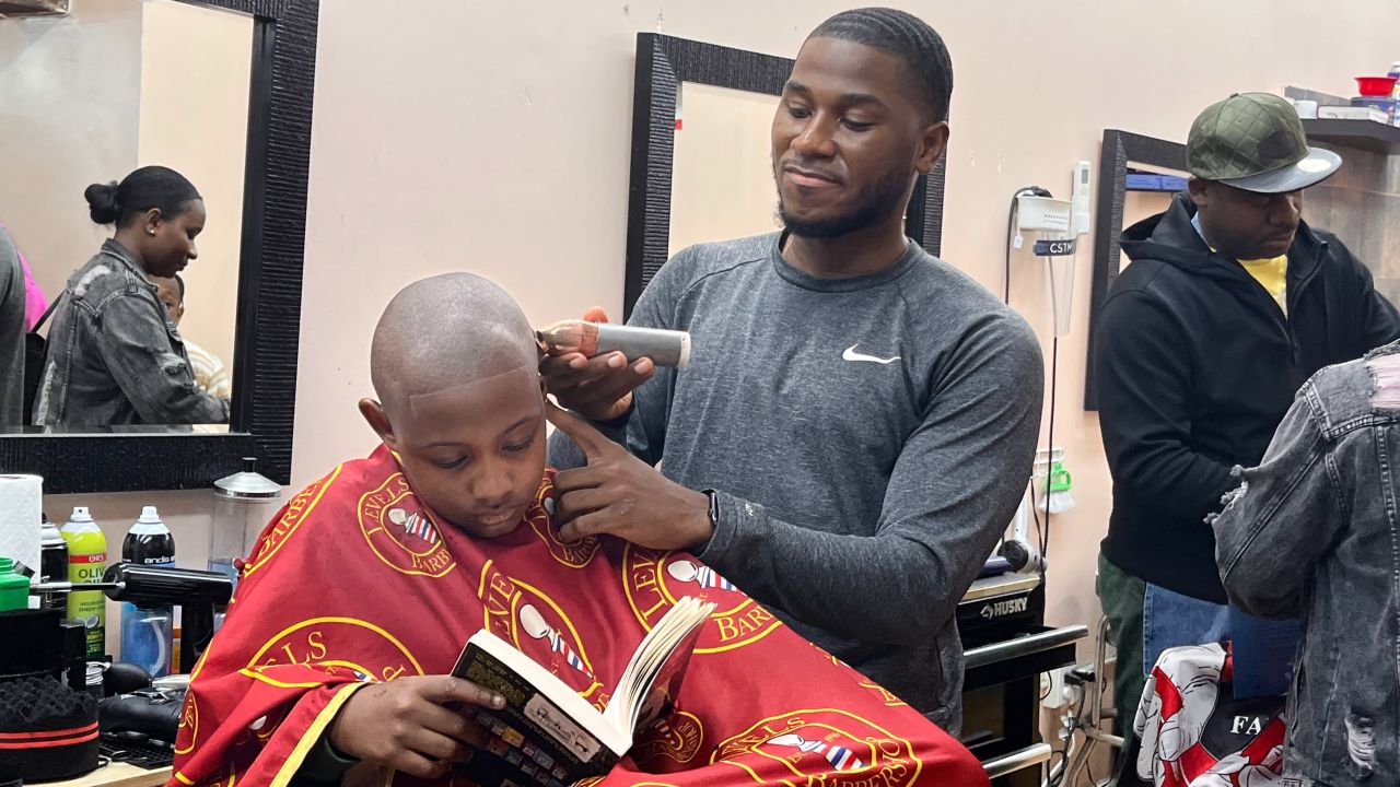 Ryan, who works at Levels Barbershop in New York, has been trained by Irby's program to engage with students.
