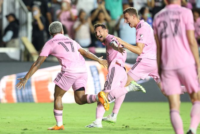 Messi celebrates after scoring a spectacular goal in his Inter Miami debut in July 2023. <a href="index.php?page=&url=http%3A%2F%2Fwww.cnn.com%2F2023%2F07%2F21%2Ffootball%2Fmessi-inter-miami-debut-free-kick-winner-spt-intl%2Findex.html" target="_blank">He curled in a free kick in stoppage time</a> to give his club a 2-1 win over Mexican side Cruz Azul in the Leagues Cup competition.