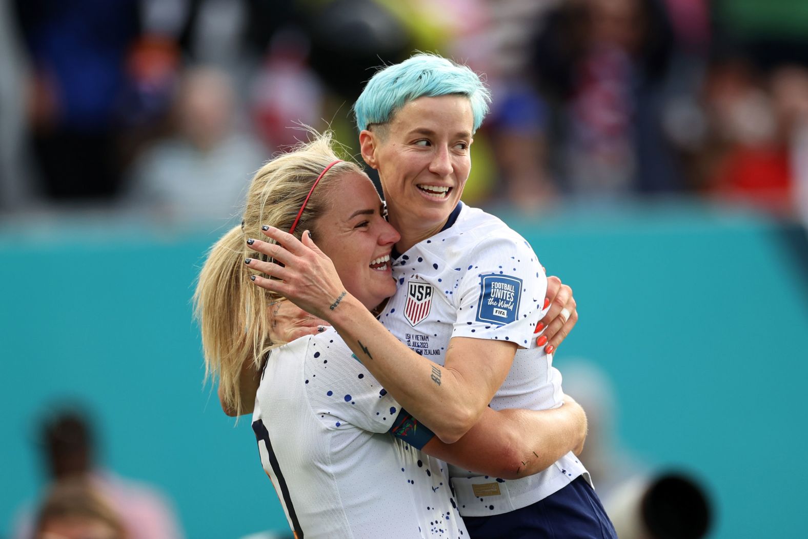 Lindsey Horan, left, celebrates with US teammate Megan Rapinoe after Horan scored the third goal against Vietnam.