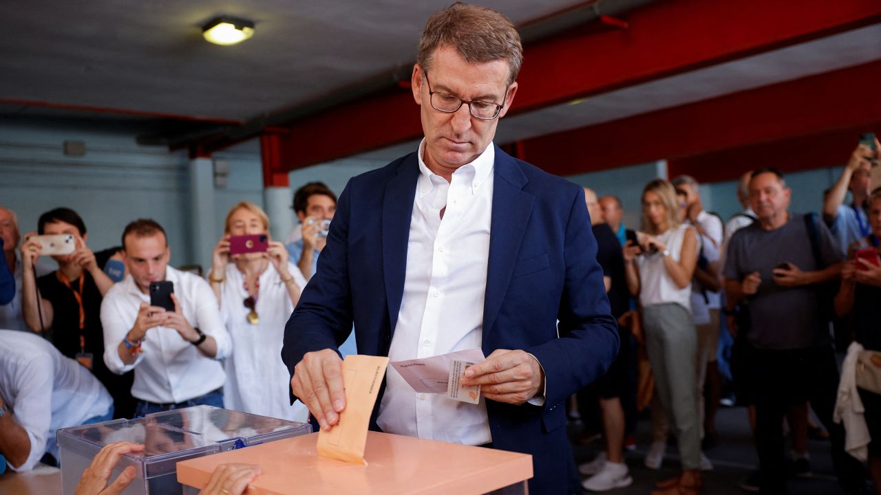 Spain's opposition People's Party leader Alberto Nunez Feijoo casting his vote.