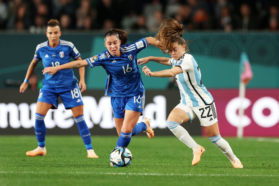 Italy's Giulia Dragoni is challenged by Estefania Banini of Argentina. At the age of 16, Dragoni became the <a href=