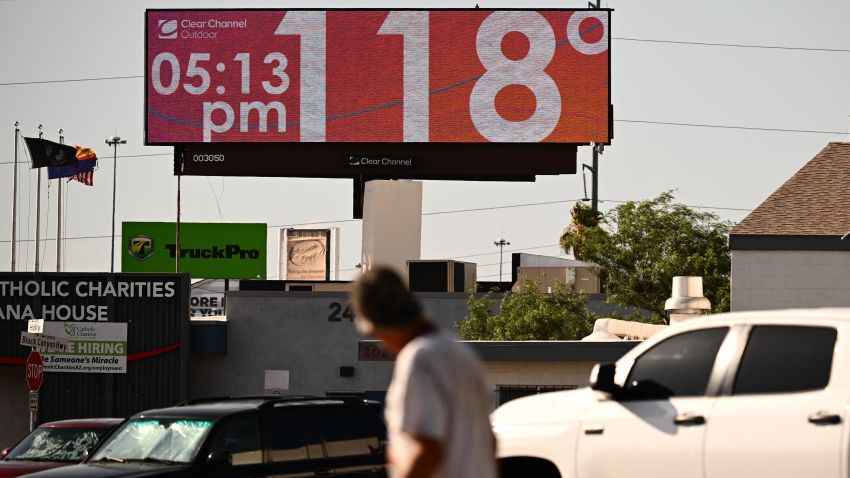 A billboard displays a temperature of 118 degrees Fahrenheit (48 degrees Celcius) during a record heat wave in Phoenix, Arizona on July 18, 2023. Swaths of the United States home to more than 80 million people were under heat warnings or advisories, as relentless, record-breaking temperatures continued to bake western and southern states. In Arizona, state capital Phoenix recorded its 17th straight day above 109 degrees Fahrenheit (43 degrees Celsius), as temperatures hit 113F (45C) Sunday afternoon. (Photo by Patrick T. Fallon / AFP) (Photo by PATRICK T. FALLON/AFP via Getty Images)