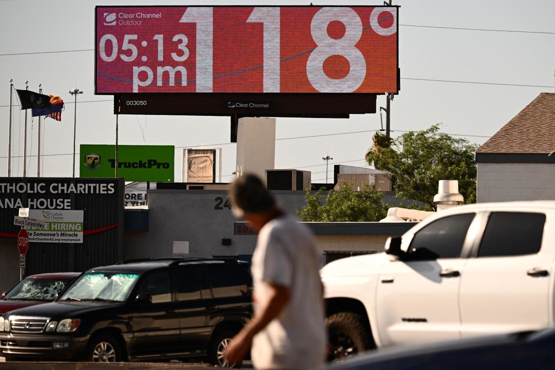 A billboard displays the temperature in Phoenix during a record heatwave on July 18.