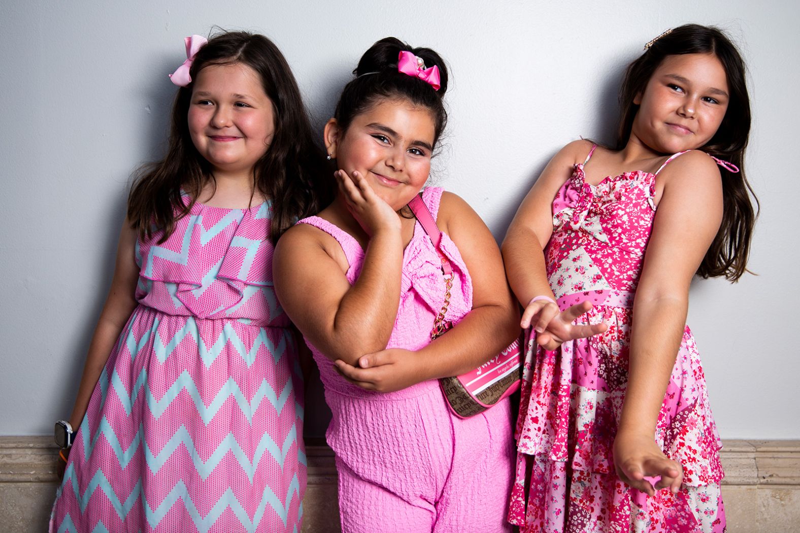 From left, Sophie Davidoff, Ayan Babayeva and Mia Ilyaich pose in Los Angeles on Saturday. "We all love pink. It's my favorite color," said Ayan, who was celebrating her birthday.