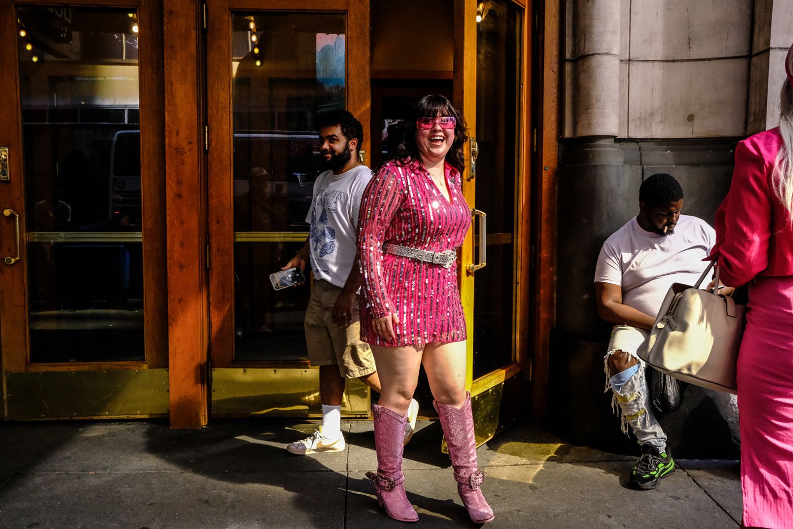 A Barbie fan attends a movie showing in New York on Friday.