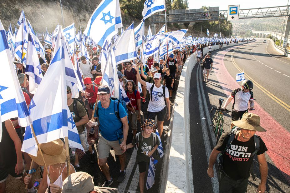 Protesters from Tel Aviv walk the entrance road to Jerusalem after a four-day march on July 22.