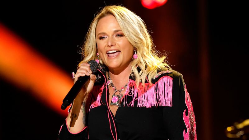 NextImg:Miranda Lambert laughs at 'Shoot tequila, not selfies' shirt | CNN