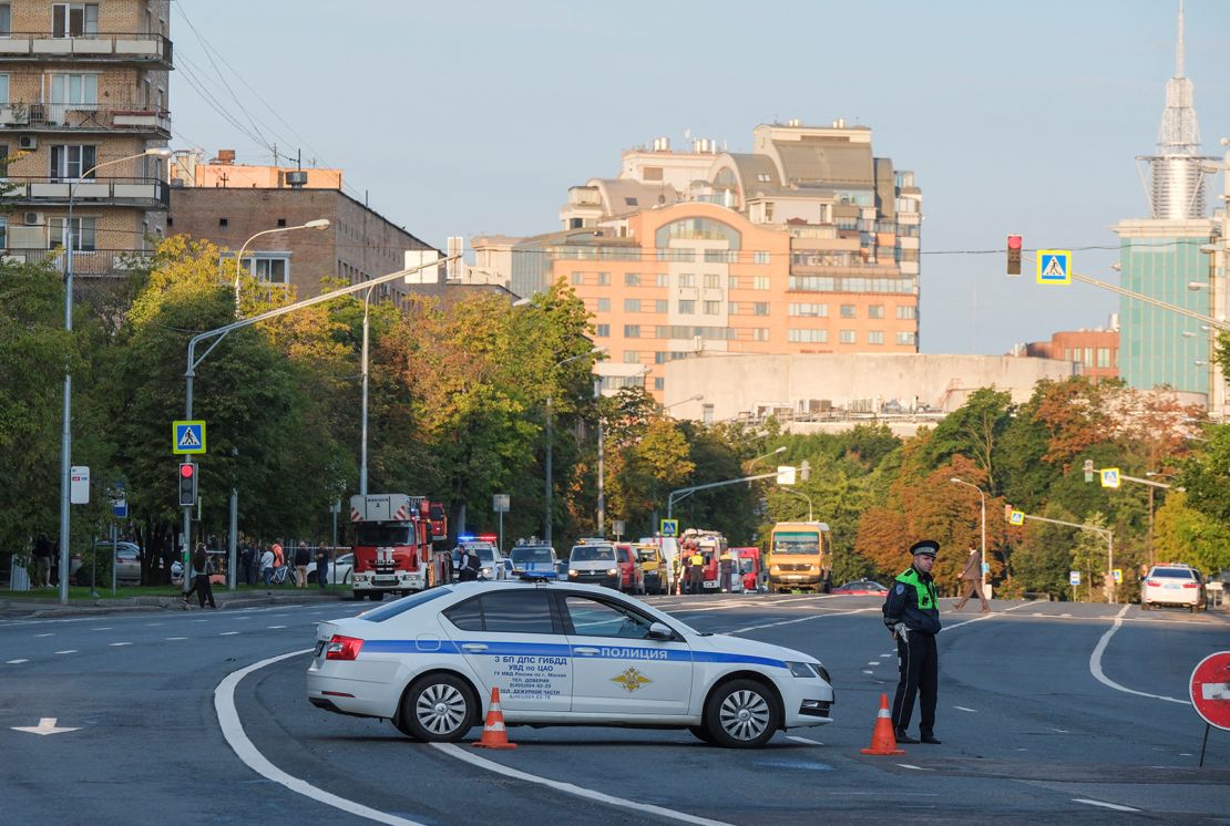 A police officer blocks a road following a reported drone attack in central Moscow on July 24, 2023. 