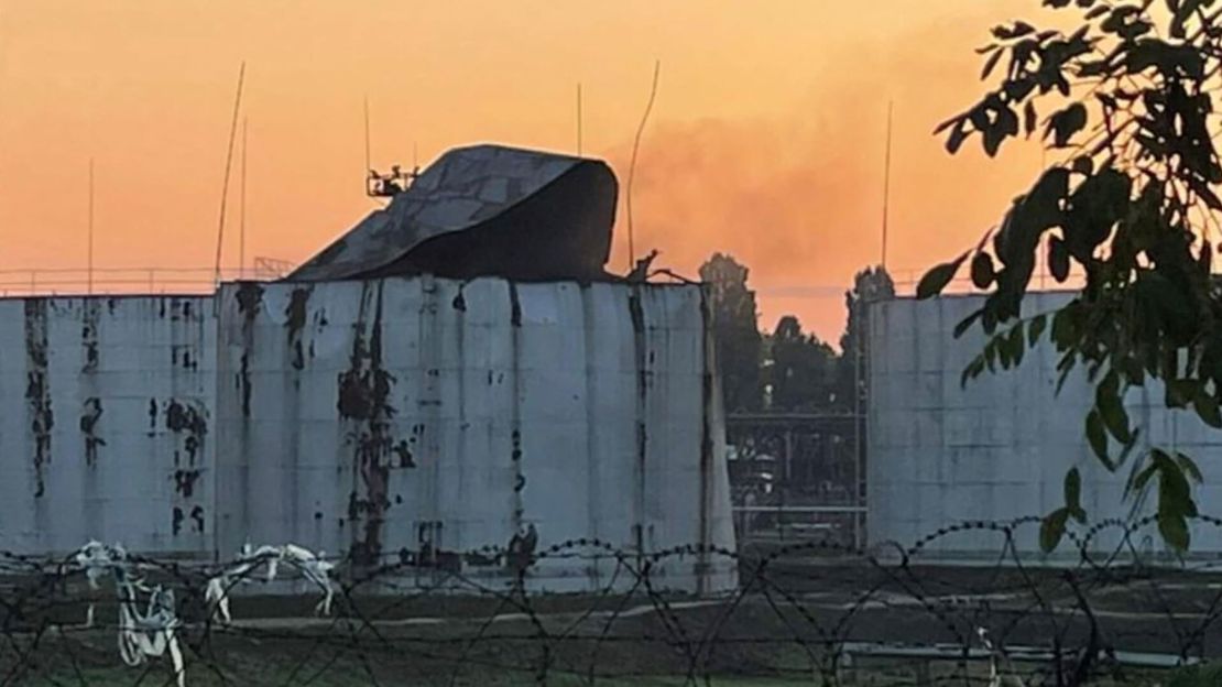 Storage tanks damaged by a Russian drone strike are seen in a sea port in Odesa on Monday, amid Russia's attack on the southern Ukrainain city.