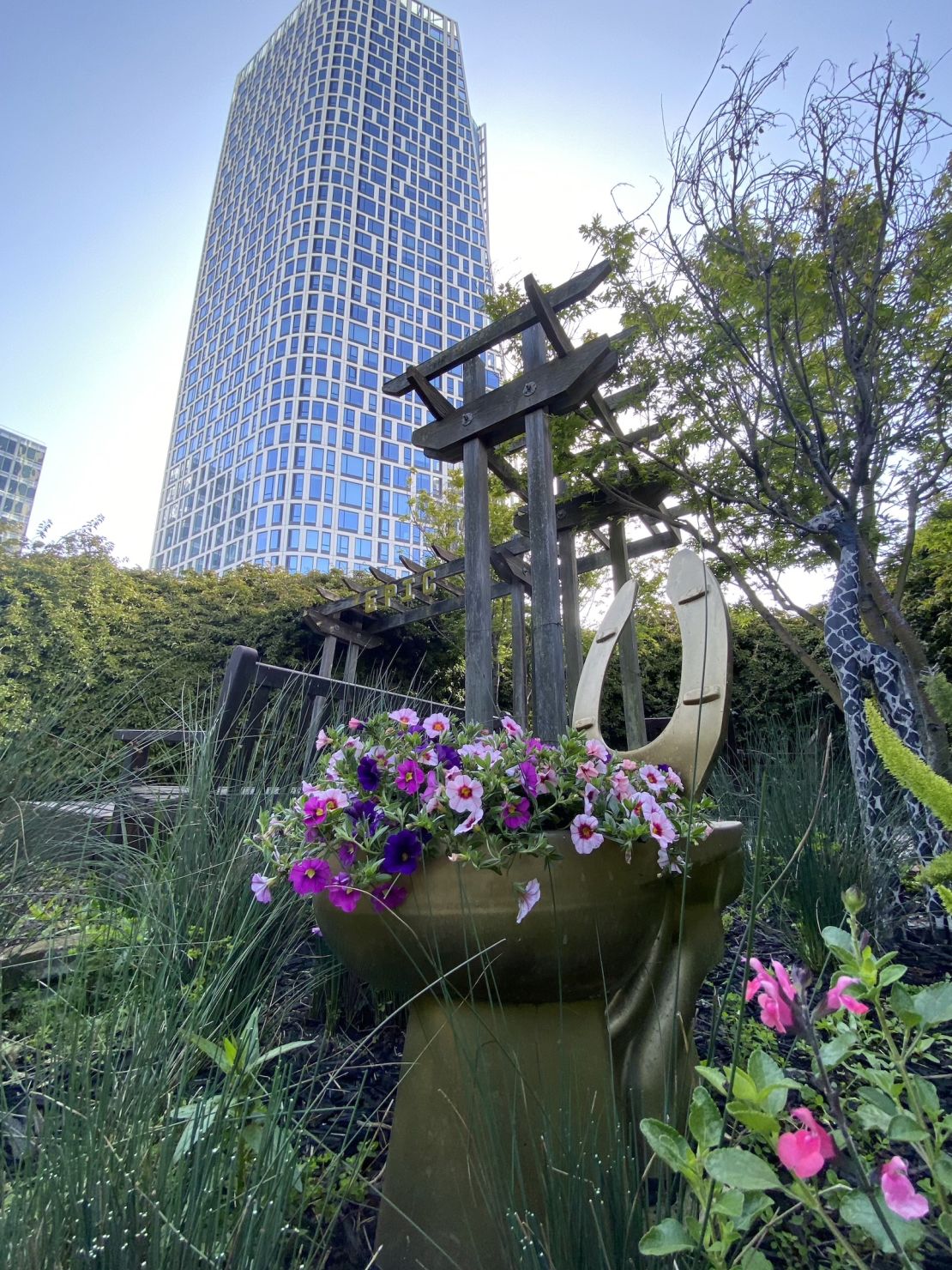 A view of Fifteen Fifty, in San Francisco, from a nearby garden where plants are grown using recycled waste from Epic Cleantec's water treatment system.