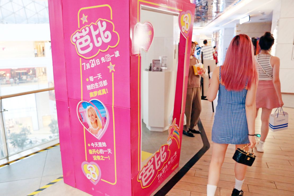 Fans pass a poster of "Barbie" at a cinema in Shanghai, China, on July 22.