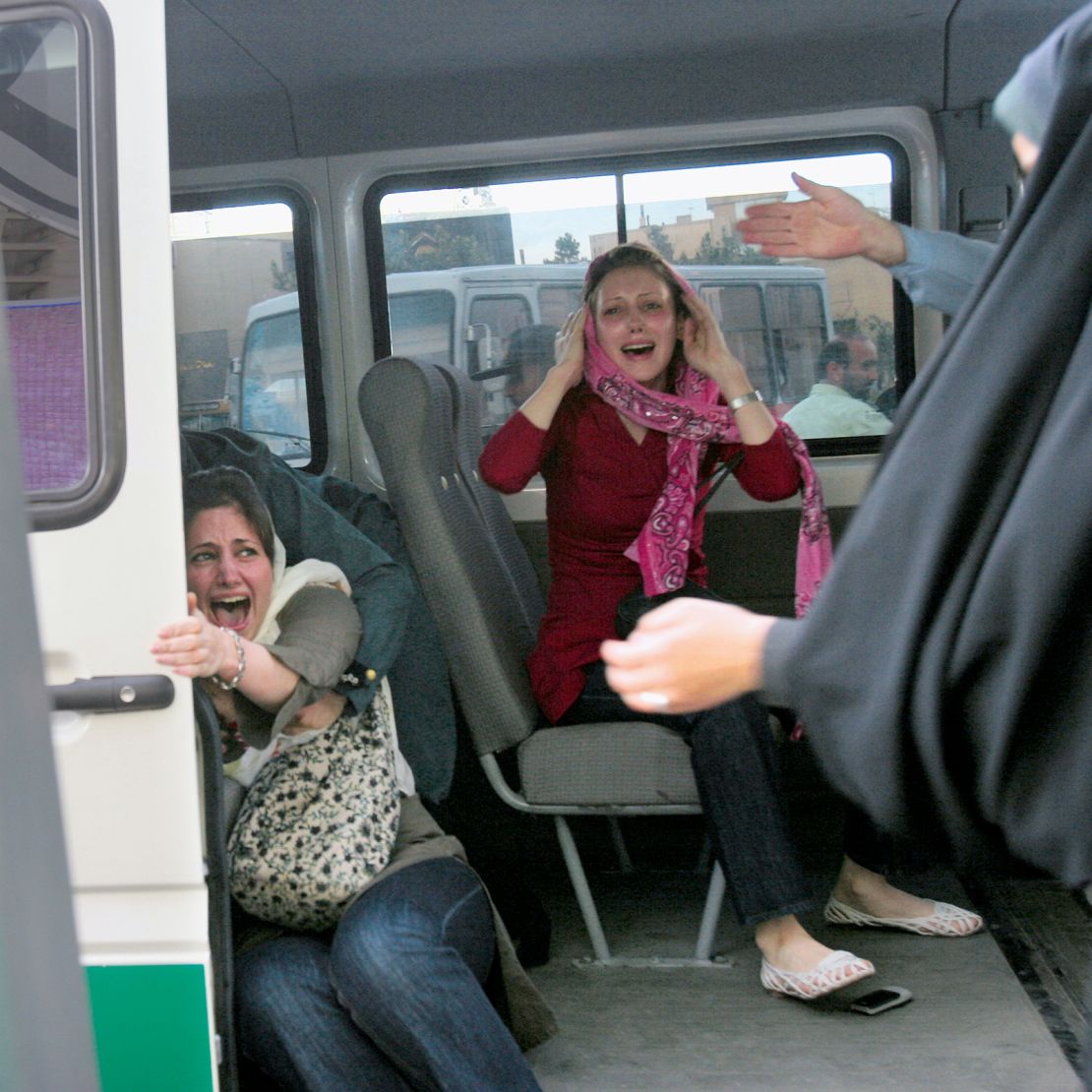 Women screaming out of fear while being arrested by the Irshad patrol for not wearing Islamic hijab. These women were taken to the detention centre after being arrested by the police. Tehran, 2007