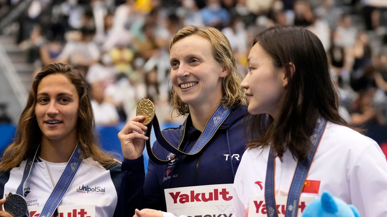 Gold medalist Katie Ledecky of United States, center, silver medalist Simona Quadarella, left, of Italy and bronze medalist Li Bingjie of China pose during ceremonies at women's 1500m freestyle finals at the World Swimming Championships in Fukuoka, Japan, Tuesday, July 25, 2023.