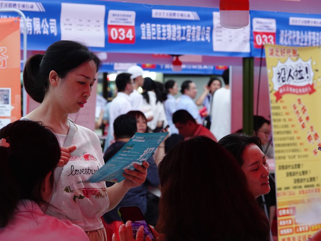 College graduates looking for jobs at a fair in central China's Hubei province on July 20.