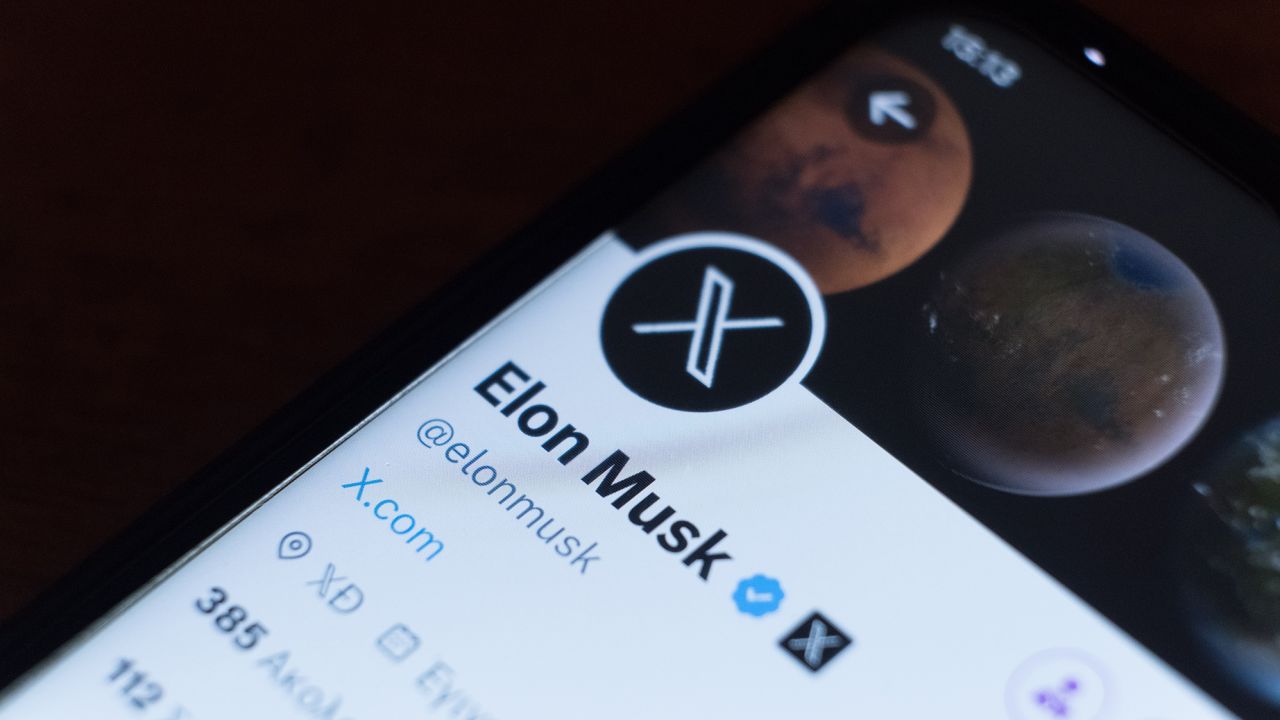 Elon Musk's Twitter with the new X is seen on a smartphone screen in Athens, Greece on July 25, 2023.