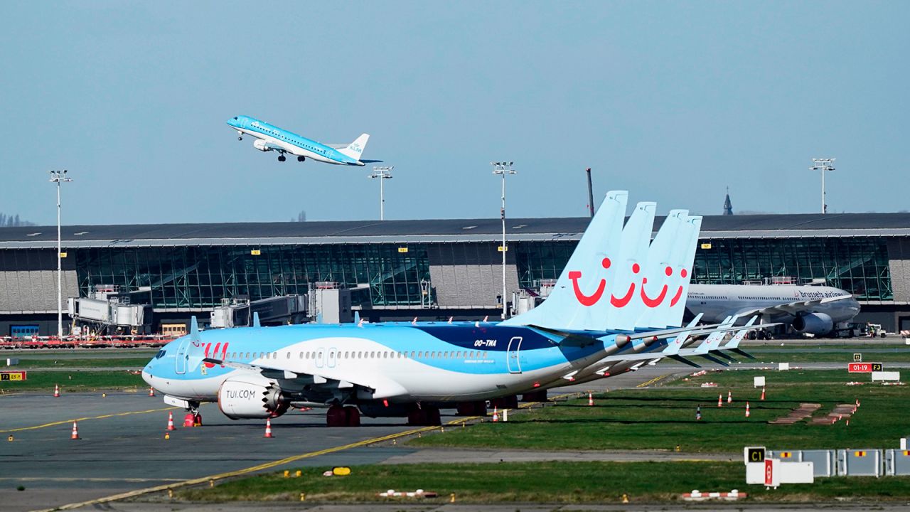 TUI airline aurcrafts are parked at Brussels Airport, in Zaventem, outside Brussels, on March 12, 2020. (Photo by Kenzo TRIBOUILLARD / AFP) (Photo by KENZO TRIBOUILLARD/AFP via Getty Images)