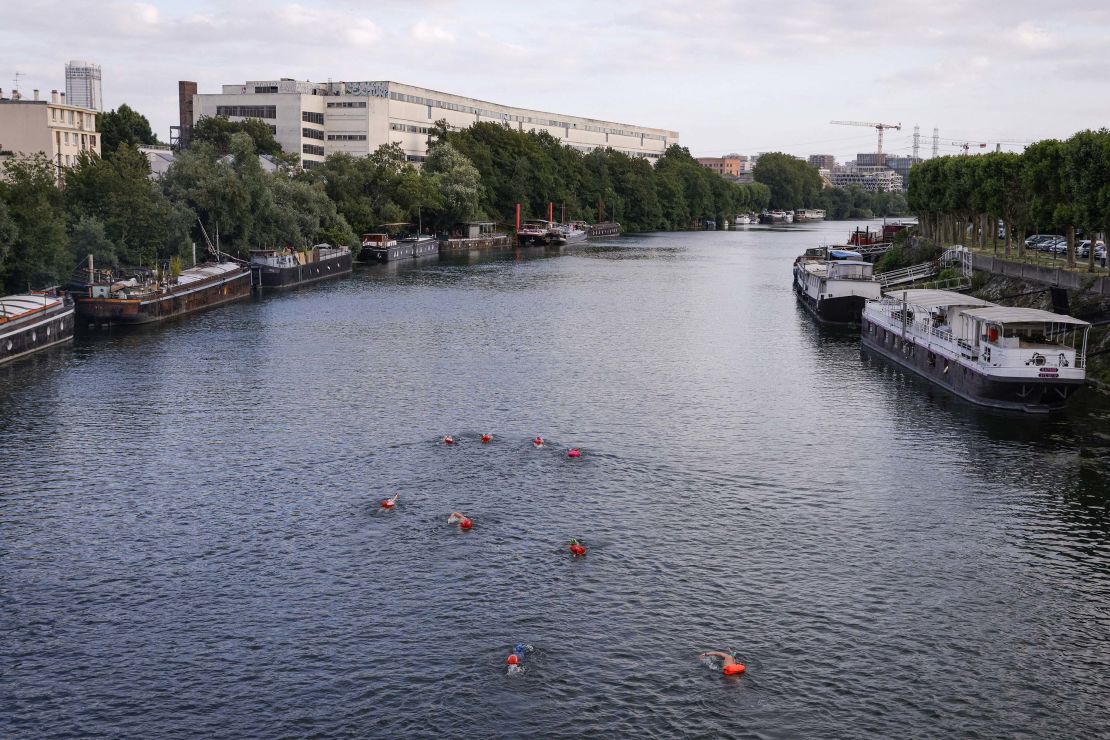 A group of swimmers in the Seine on July 2.