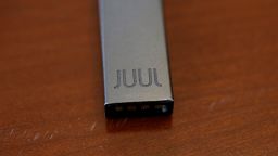 This Tuesday, April 10, 2018 file photo shows a Juul vaping device that was confiscated from a student at a high school in Marshfield, Mass. (AP Photo/Steven Senne, File)