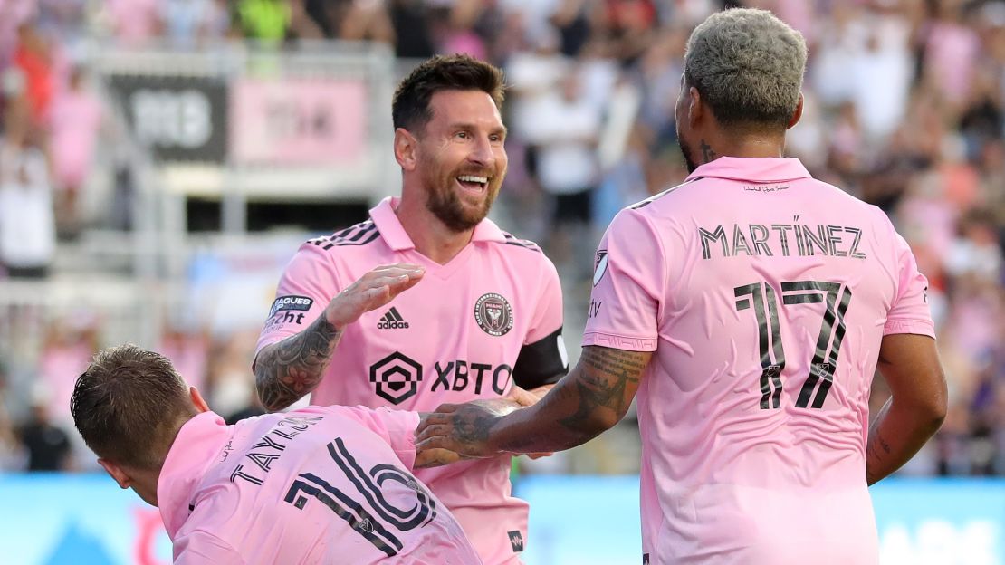 Messi celebrates with his teammates after scoring against Atlanta United.