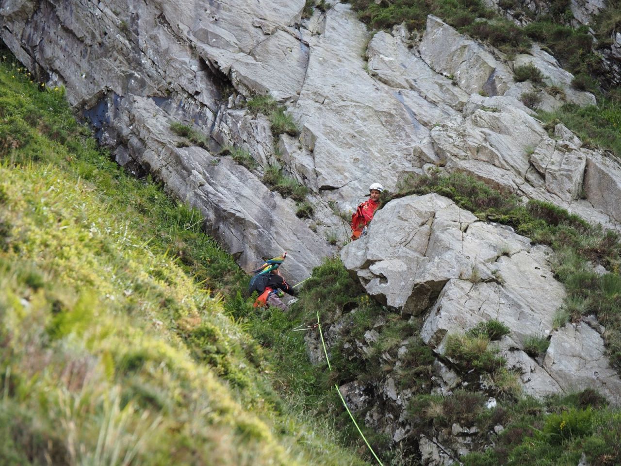 The woman got stuck on high cliffs after attempting to find her parrot.