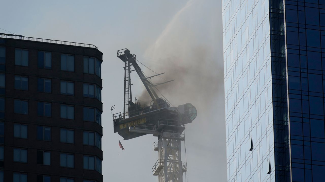 Smoke rises from a construction crane that caught fire in Manhattan on Wednesday.