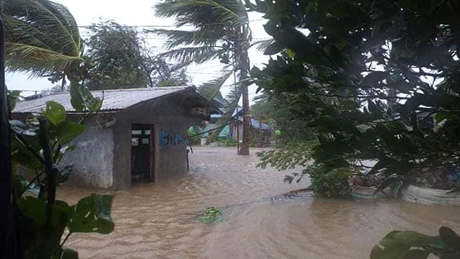 Heavy rainfall floods several homes in Simbaluca, Santa Teresita, Cagayan due to Typhoon Doksuri, named locally as Egay.