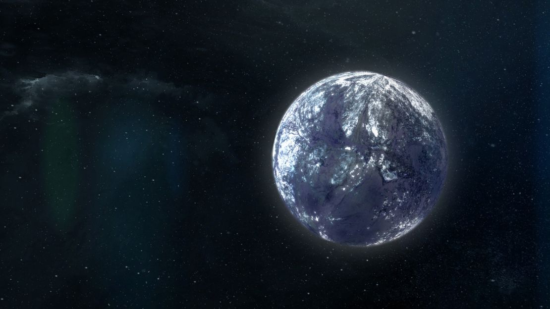 This artist's concept shows an ice-encrusted, Earth-mass rogue planet drifting through space alone.
