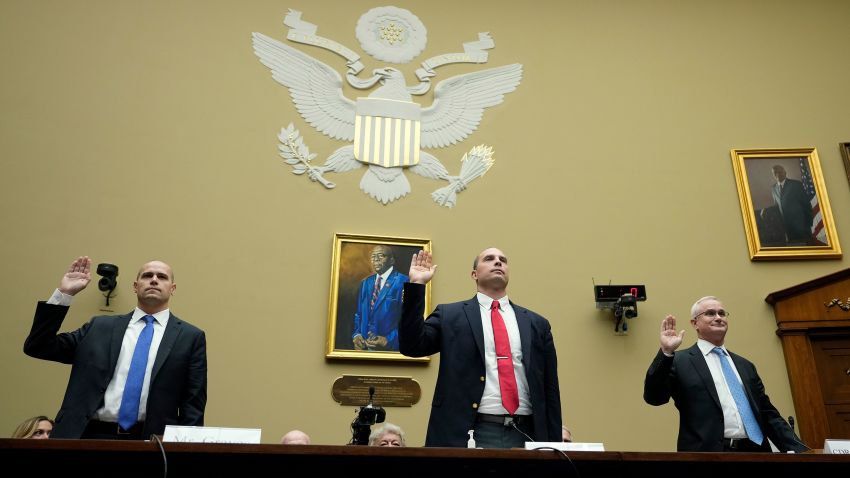 Ryan Graves, executive director of Americans for Safe Aerospace, David Grusch, former National Reconnaissance Officer Representative of Unidentified Anomalous Phenomena Task Force at the U.S. Department of Defense, and Retired Navy Commander David Fravor are sworn-in during a House Oversight Committee hearing titled "Unidentified Anomalous Phenomena: Implications on National Security, Public Safety, and Government Transparency" on Capitol Hill on July 26, 2023 in Washington, DC. 