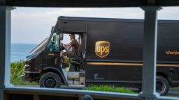 A United Parcel Service truck searches for a house while driving along the coast of Cape Cod on July 24, 2023 in Orleans, Massachusetts. 