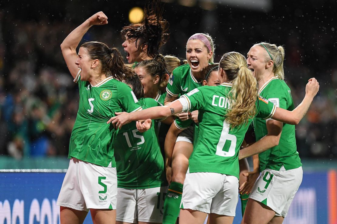 Republic of Ireland players celebrate after McCabe's goal against Canada.