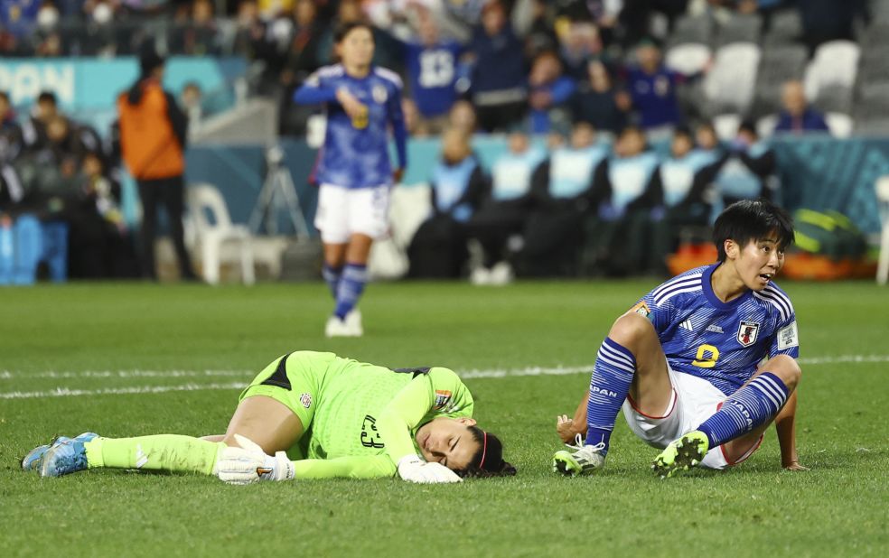 Costa Rican goalkeeper Daniela Solera is shaken up during a play against Japan. She was able to continue.