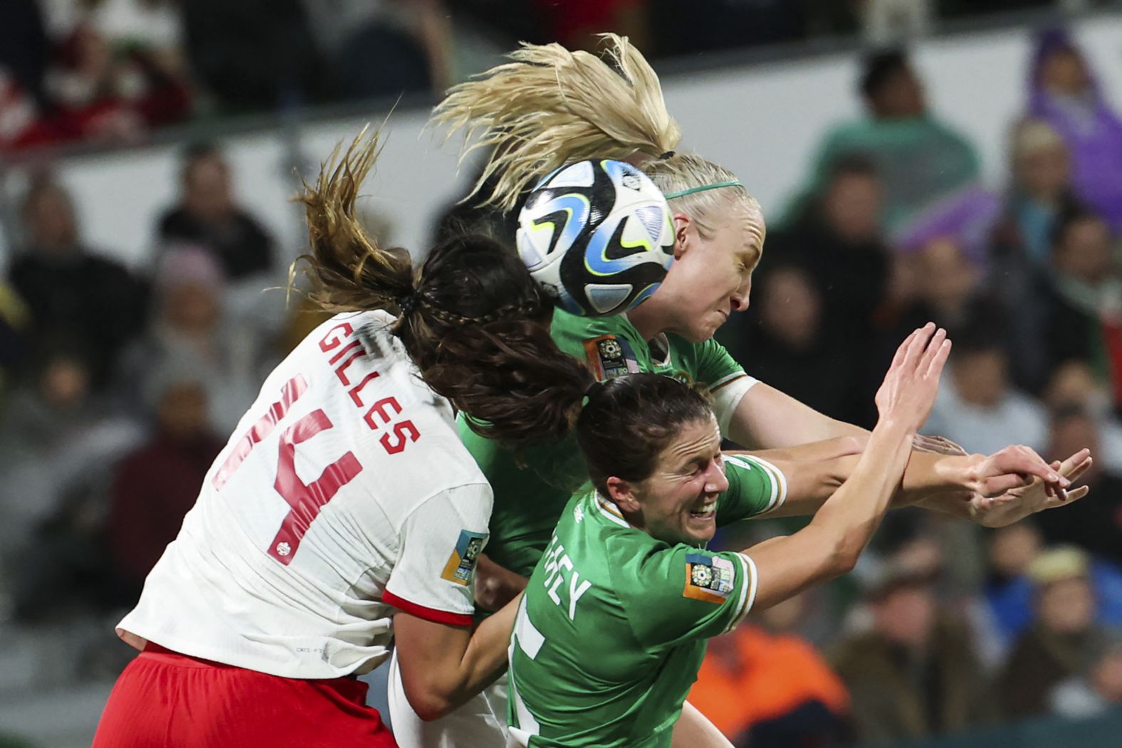 Canada's Vanessa Gilles competes for a header with Ireland's Niamh Fahey, bottom, and Louise Quinn during a match on July 26. <a href="index.php?page=&url=https%3A%2F%2Fwww.cnn.com%2F2023%2F07%2F25%2Ffootball%2Fcanada-spain-japan-2023-womens-world-cup-spt-intl%2Findex.html" target="_blank">Canada won 2-1</a>.