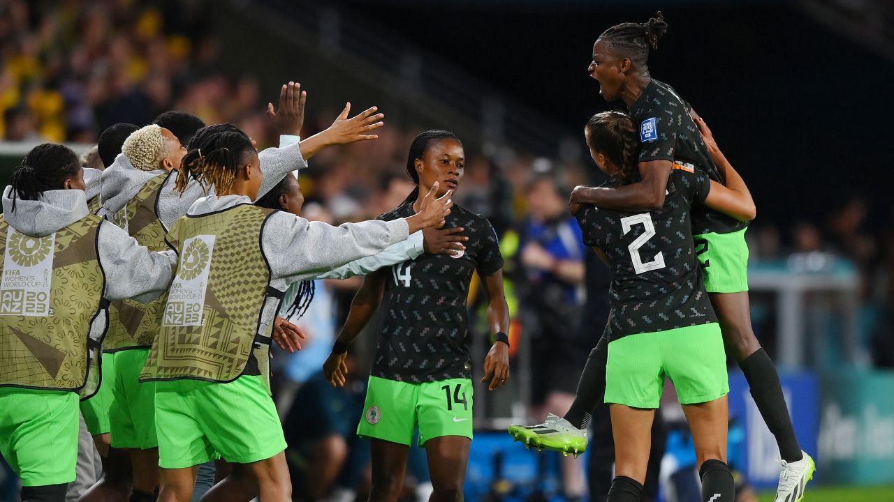 Uchenna Kanu of Nigeria celebrates with teammates after scoring her team's first goal against Australia. 