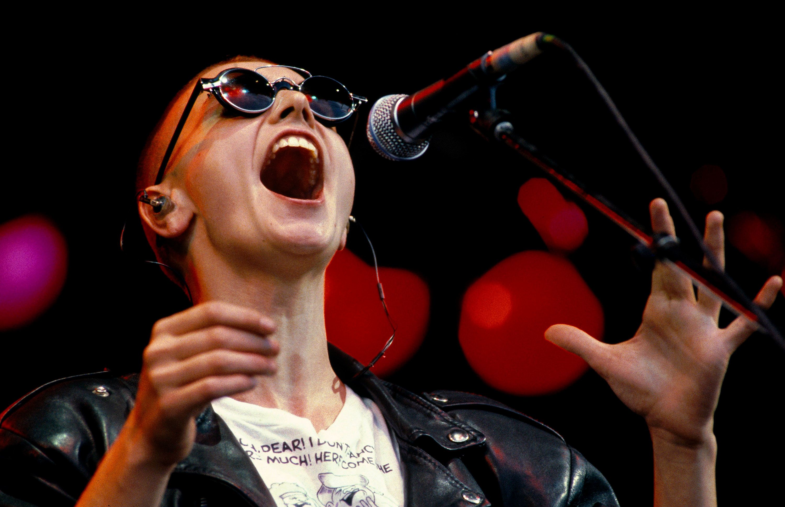 O'Connor performs at the Glastonbury Festival in 1990.