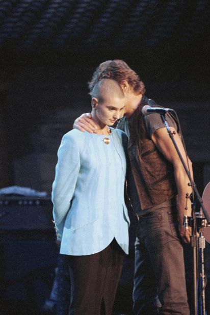 Kris Kristofferson comforts Sinead O'Connor after she was booed during a Bob Dylan anniversary concert in New York in October 1992. This was a couple of weeks after the "SNL" protest.