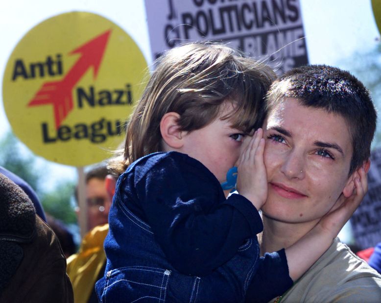 O'Connor holds her daughter, Roisín, during an anti-racism demonstration in Dublin in 2000.