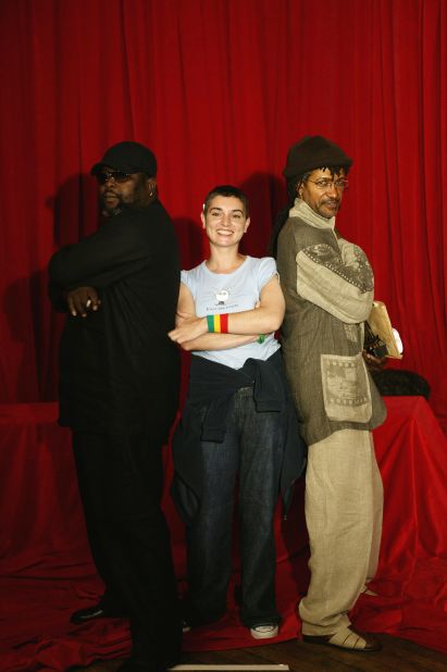 O'Connor poses with reggae stars Sly & Robbie at the Mojo Awards in 2005.
