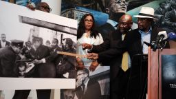 NEW YORK, NEW YORK - JULY 25: Mustafa Hassan, 84, an associate of Malcolm X, (R) points to himself in a picture following the assassination of Malcolm X during a news conference with Civil rights attorney Ben Crump and and Malcolm X's daughter IIyasah Shabazz on July 25, 2023 in New York City. They allege more information has been discovered which they say points to efforts by the FBI to cover up a conspiracy to murder Malcolm X. Crump and his team said they were unveiling the information, including a new witness speaking for the first time, to show negligence or a possible cover up in the investigation of the famed civil rights leader. Mr. Hassan was at the scene of the assassination but was never interviewed by police. He allegedly heard police ask if a suspected gunman was "with us" after police witnessed Malcolm X's supporters beating him. Hassan said he saw another gunman, which he has stated in an affidavit. (Photo by Spencer Platt/Getty Images)