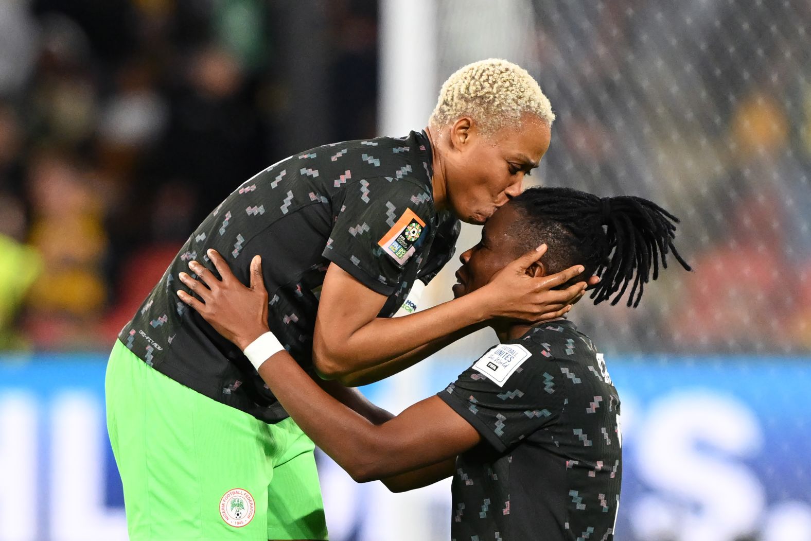 Onome Ebi, left, and Osinachi Ohale celebrate after <a href="index.php?page=&url=https%3A%2F%2Fwww.cnn.com%2F2023%2F07%2F27%2Ffootball%2Fnigeria-australia-womens-world-cup-spt-intl%2Findex.html" target="_blank">Nigeria defeated Australia 3-2</a> on July 27. The stunning result means Nigeria has a one-point lead going into its final group game against already eliminated Ireland, while co-host Australia faces a must-win match against Canada.
