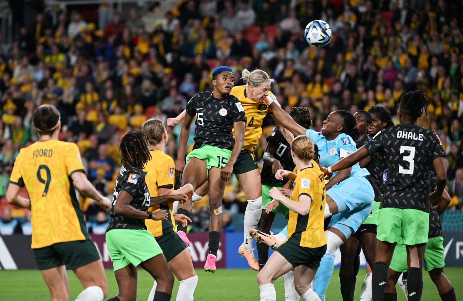 Players from Australia and Nigeria compete for a ball in the air on July 27.